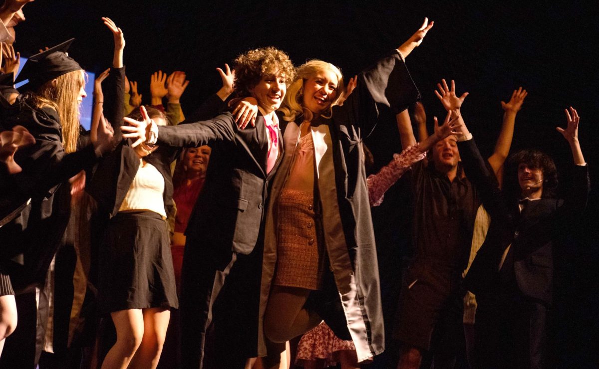 Nearing the end of the play 'Legally Blonde', much of the cast gathers around and cheers. They performed on Wednesday for the staff for free.