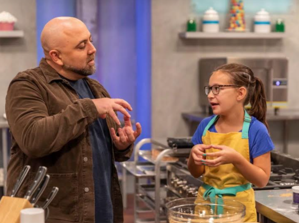 Totaro explains the confectionary treat shes working on to Kids Baking Championship judge Duff Goldman. She appeared on this season in 2019 and earned sixth place.