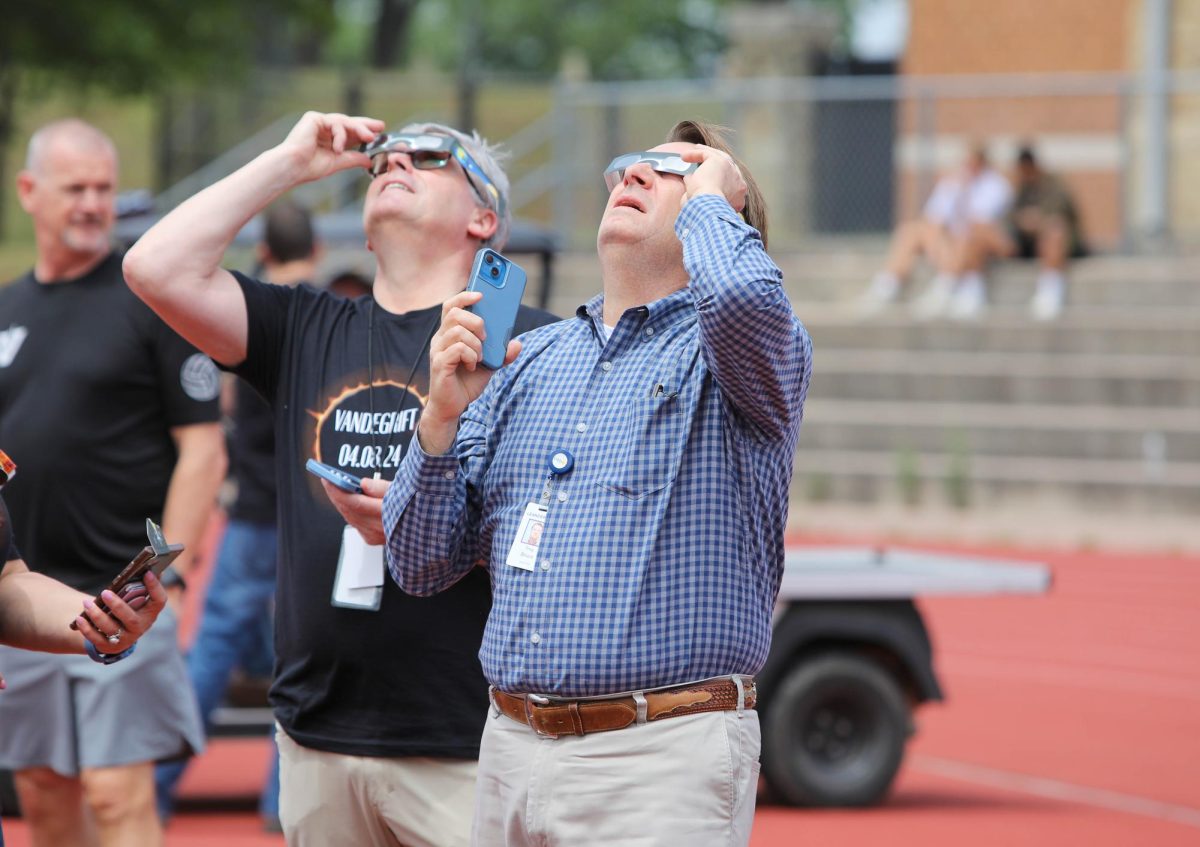 Enthusiastic students, staff see totality of solar eclipse at football stadium