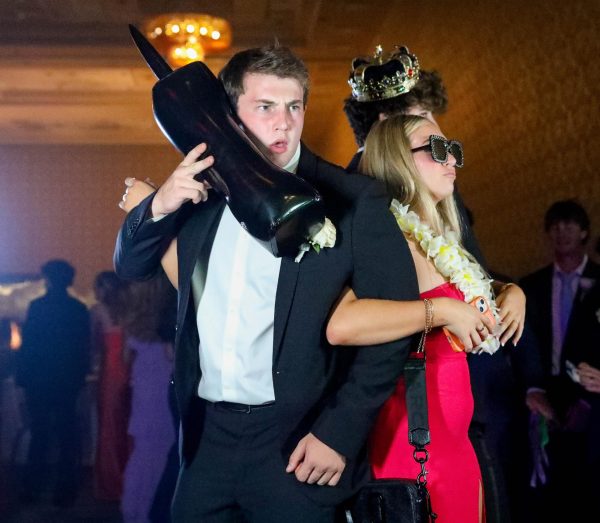 Navigation to Story: Students, staff float among the clouds at prom