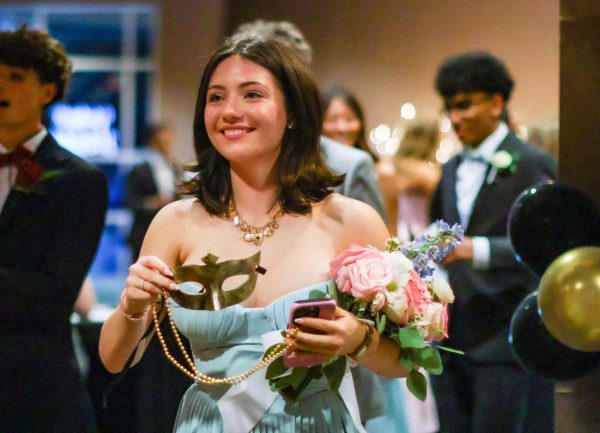 Navigation to Story: Prom is a masquerade