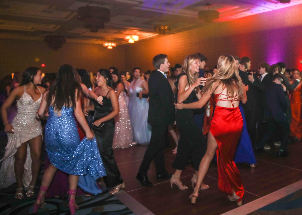 Behind the mask: Students, staff stage extravagant prom