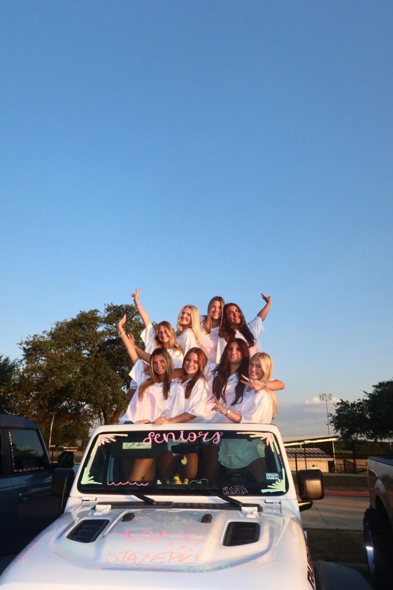 Contributing to first day traditions, senior girls decorate their cars and wear matching jerseys to celebrate the start of the year.