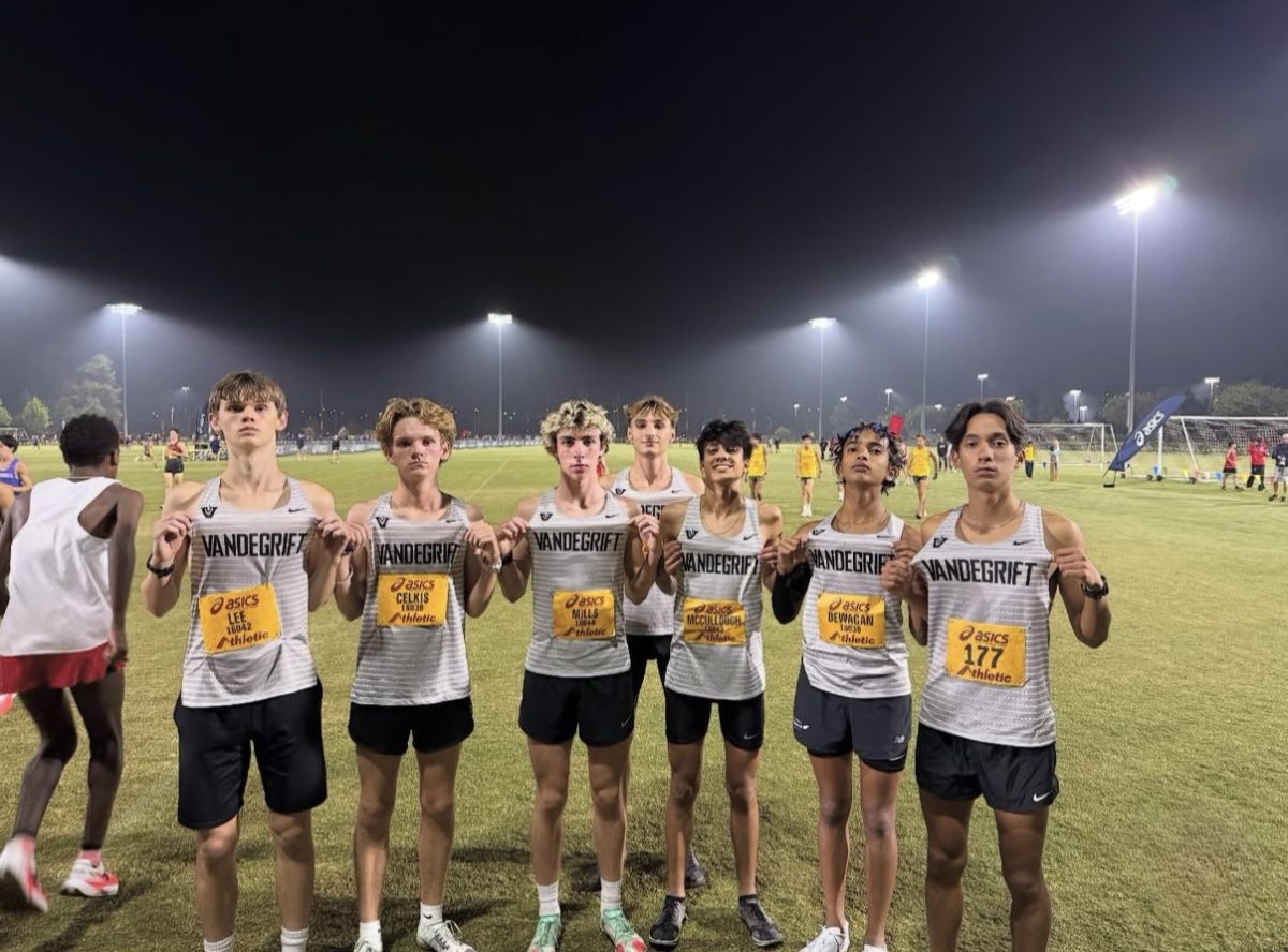 Boys varsity members pose for team photo.