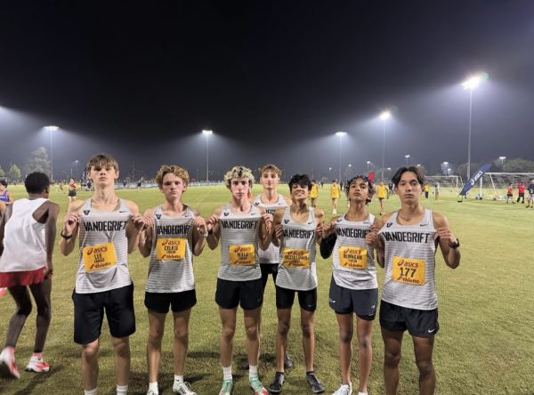 Boys varsity members pose for team photo.