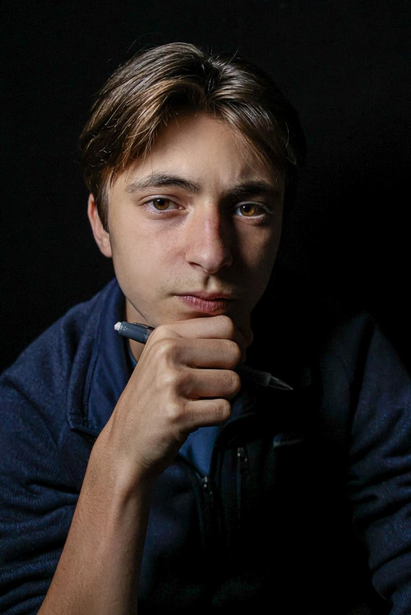 Junior Sacha Peeters poses for a portrait photoshoot. He is currently ranked fifth in the eleventh grade class.