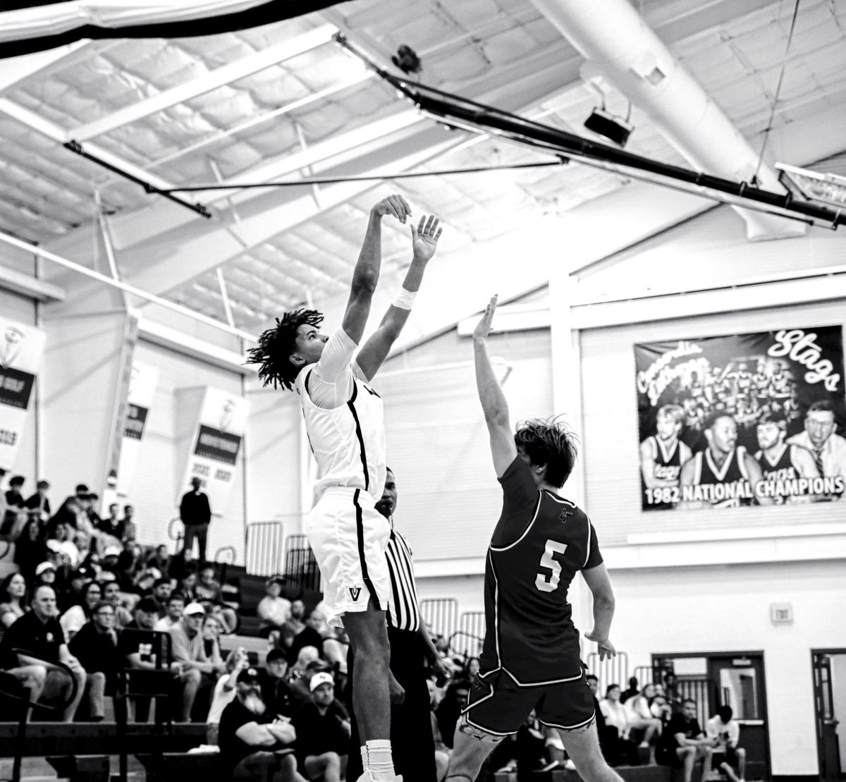 Junior Destin Herring rises above defender as he takes a jump shot. 