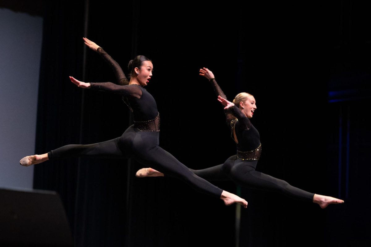 Seniors Kara Yuan and Kassie Wissen perform together and place first in the high school duets category.