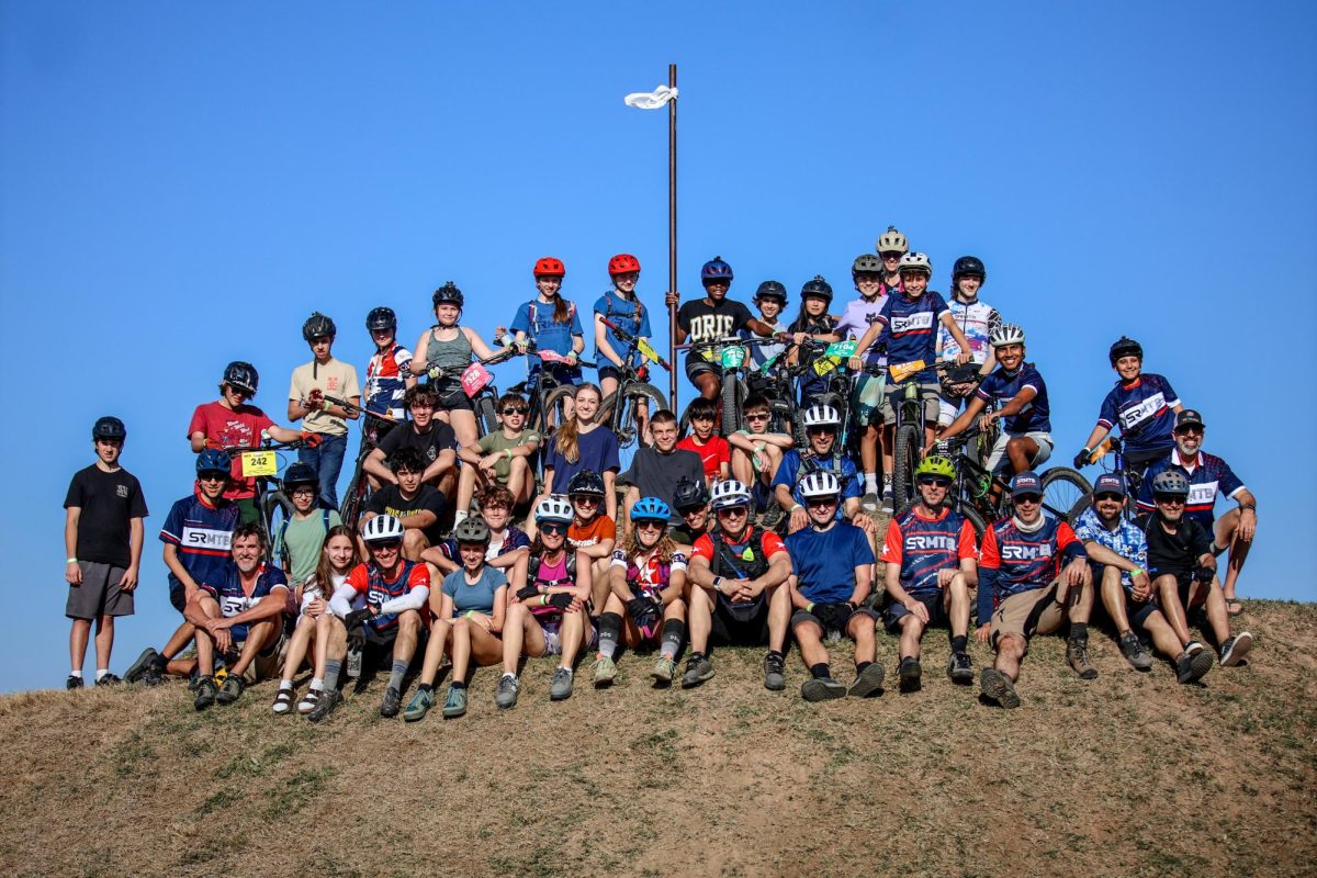 The Steiner Ranch Mountain Biking Team poses to take a photo at Milican Reserve North and South meet. 
