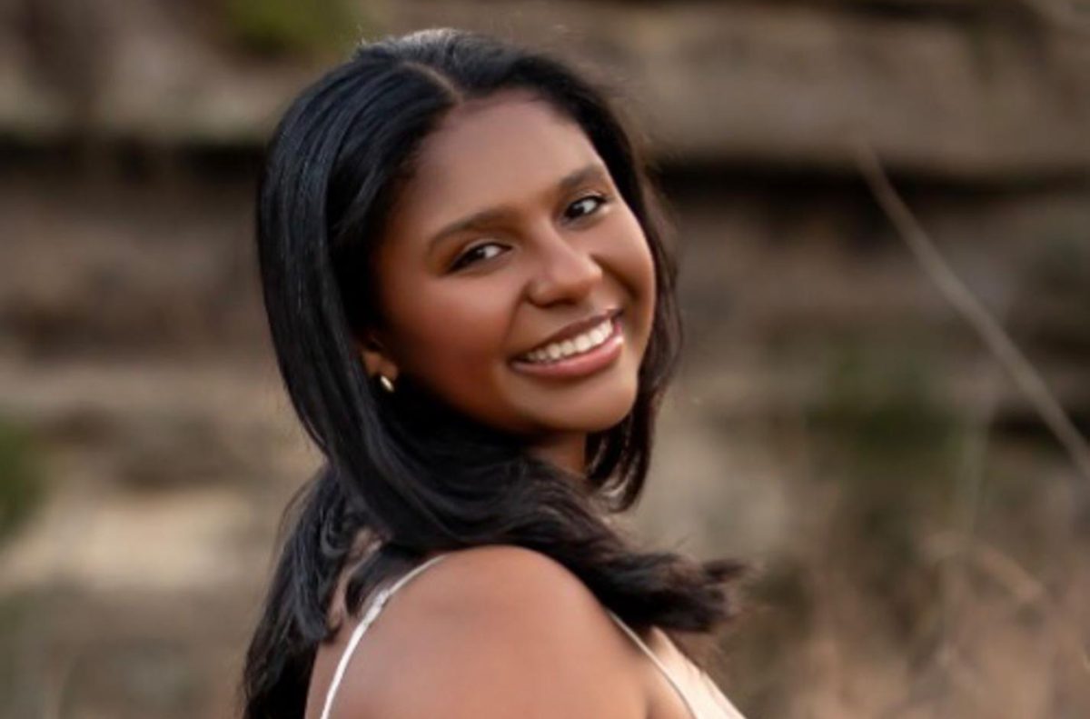 Senior Saron Amsalu poses for senior pictures at Bull Creek on Feb. 26. Senior photographer Tishy Bryant took Amsalu's pictures. "It was really fun feeling like a model for the day and working with a talent like Tishy — these pictures are gorgeous," Amsalu said. 