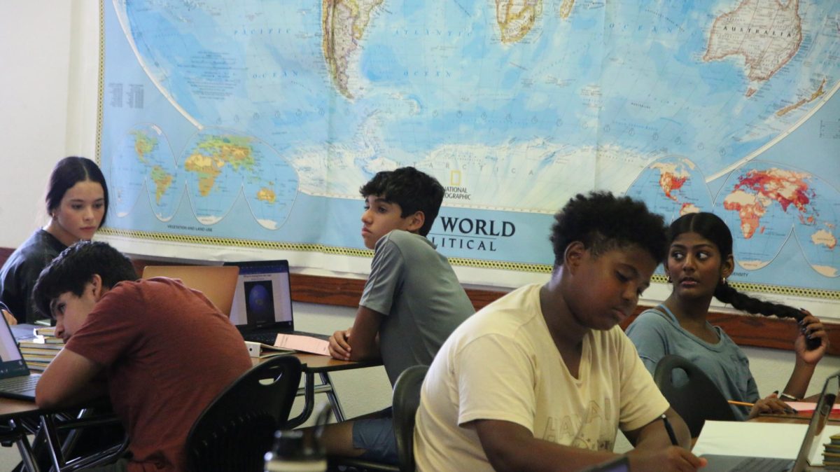 Students in an AP Human Geography class take notes as teacher Leslie Giesenschlag lectures.